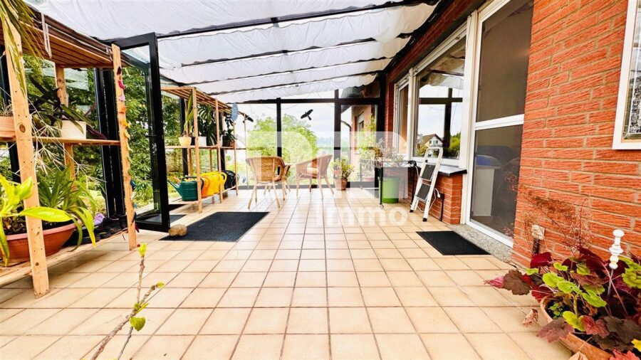 Modernisiertes Einfamilienhaus mit Einliegerwohnung, Wintergarten, Sauna und 2 Garagen - EG Wintergarten